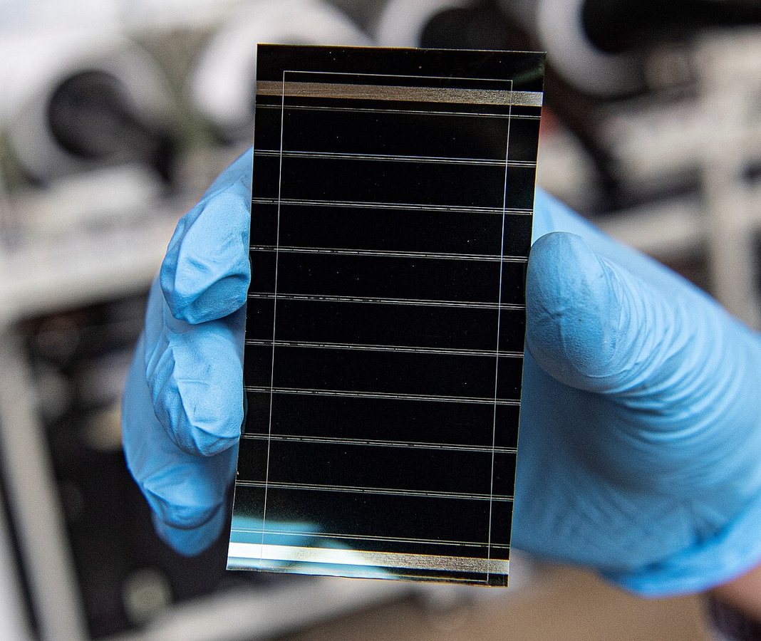 Bilayer interface lifts all-perovskite triple-junction solar cells to 27.3% efficiency