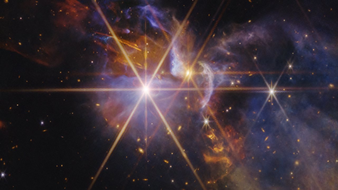 Infant Stars Illuminate Cosmic Fireworks in New Space Image