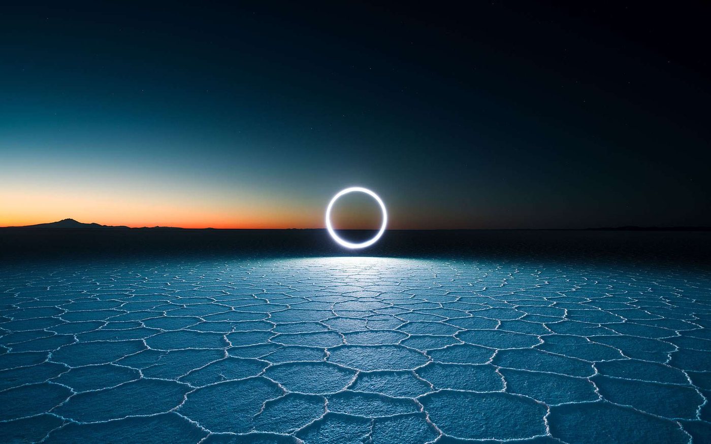 Photographer Reuben Wu Uses Drones to Create Artificial Light Circles in Desert Skies